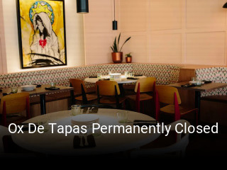Ox De Tapas Permanently Closed book table