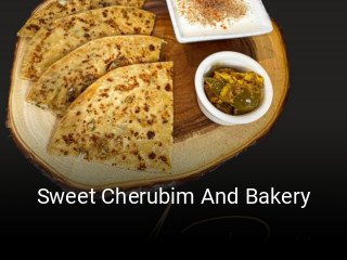 Sweet Cherubim And Bakery reserve table